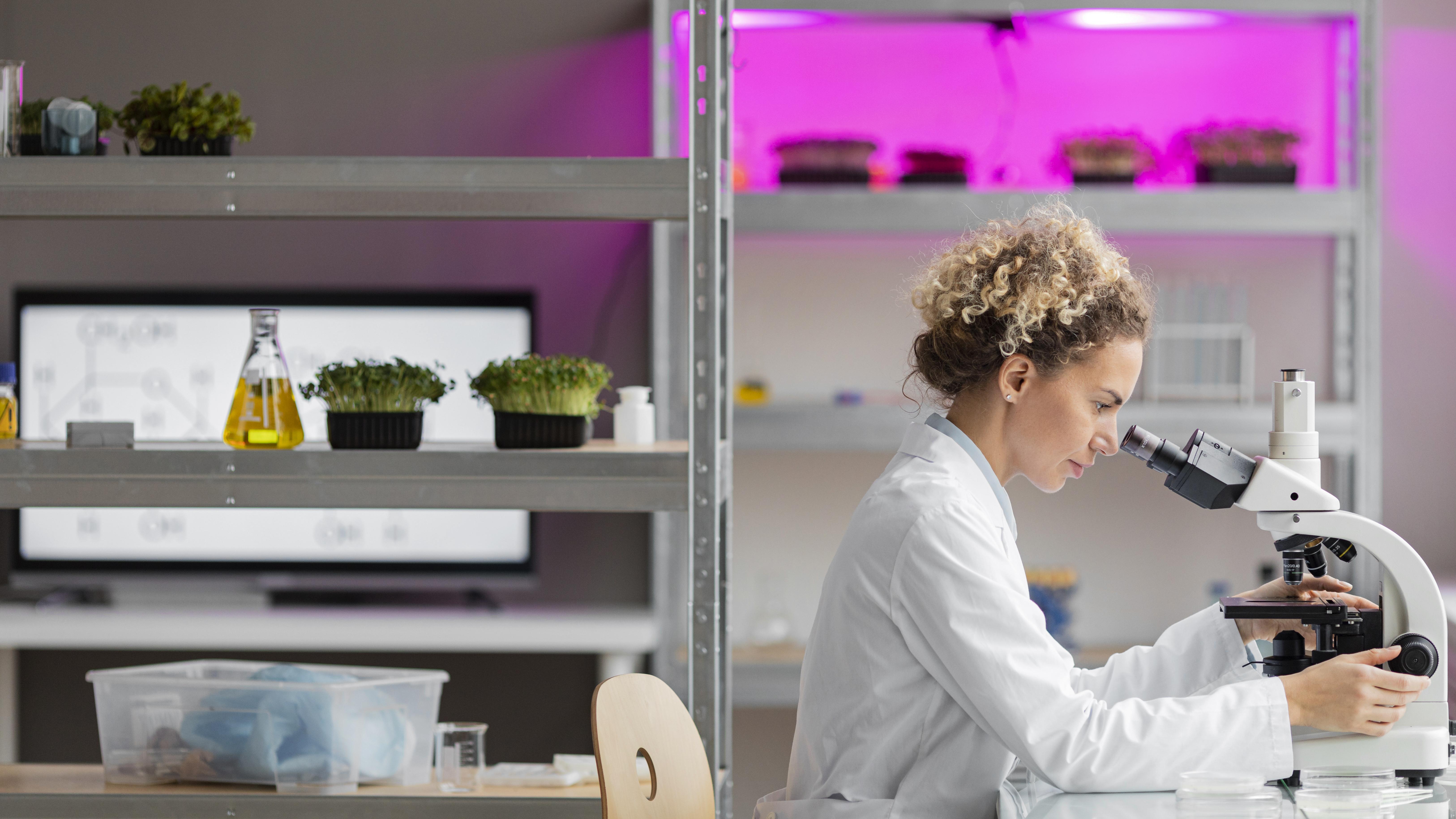 side-view-female-researcher-laboratory